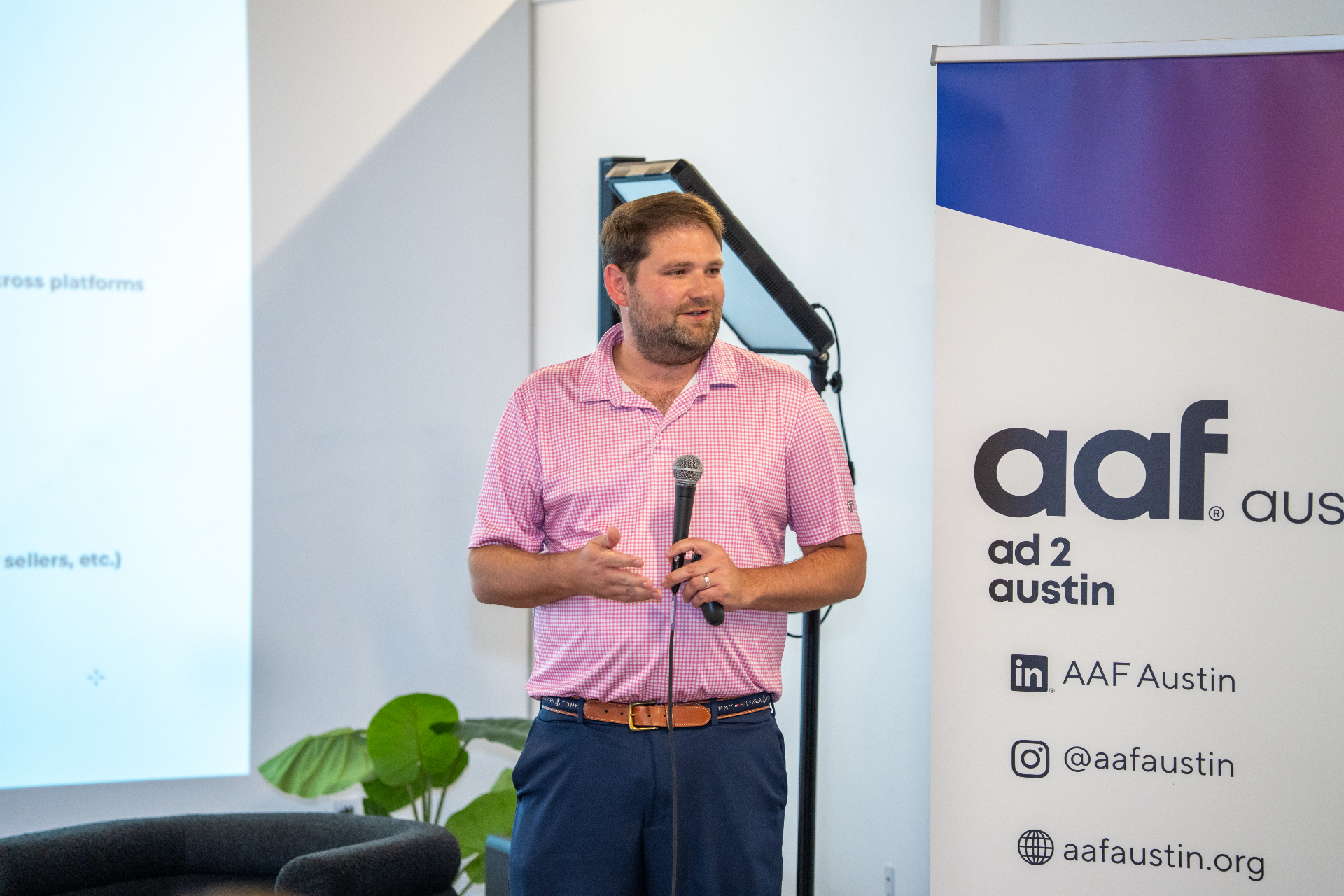 Taylor Jones, founder of ATX Marketing Innovators, speaking at an Austin marketing event